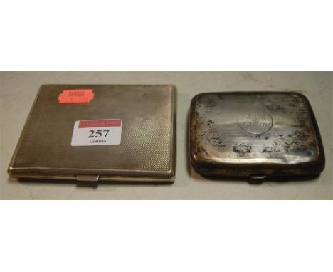 A mid 20th century silver pocket cigarette case having all over engine turned decoration together with one other silver pocke