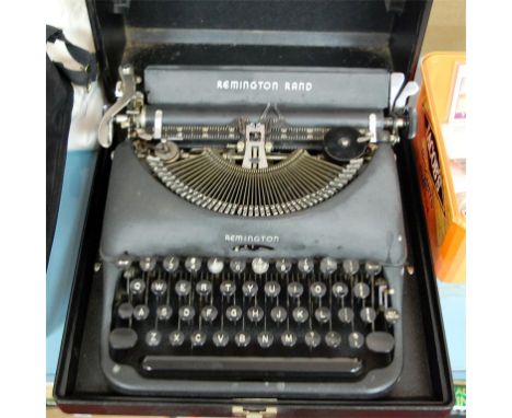 A Remington Rand typewriter, cased
