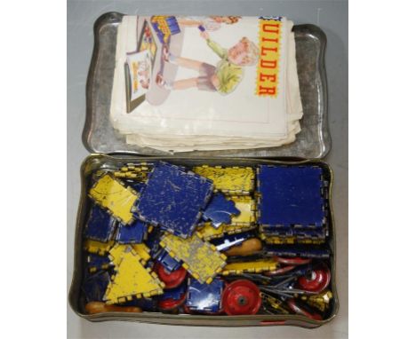 A box of assorted Dinky Toys Builder and Meccano, with instructions for outfits Nos. 1 and 2