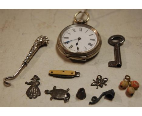 Mixed lot to include continental silver cased open face fob watch, sundry pendants, miniature buttonhook etc
