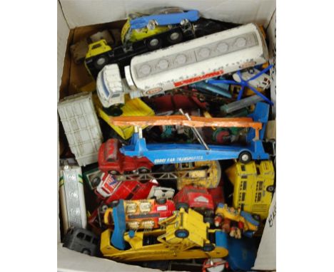 A box of assorted loose and playworn diecast toy vehicles to include; ESSO tanker, Corgi car transport etc 