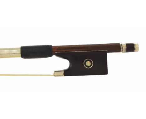 Silver mounted violin bow stamped Jul. Heinr. Zimmermann, the stick round, the ebony frog inlaid with silver rings enclosing 