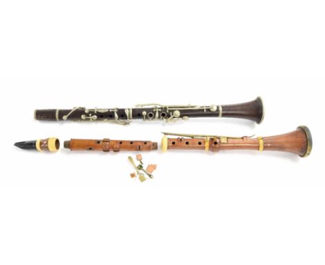 Seven-keyed boxwood clarinet in Bb by Whitaker, London, c1830, ivory mounts, brass keys, ebony mouthpiece, length 656mm., wit