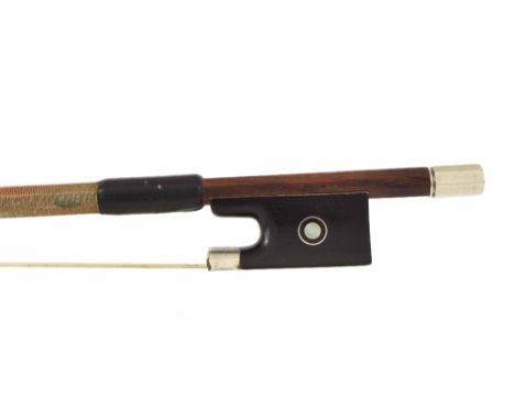 French silver mounted violin bow by and stamped E. Sartory ? Paris, the stick round, the ebony frog inlaid with silver rings 