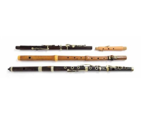 Composite one-keyed boxwood flute, the head joint by Cahusac, London, ivory mounts, the remaining sections unmounted with sin