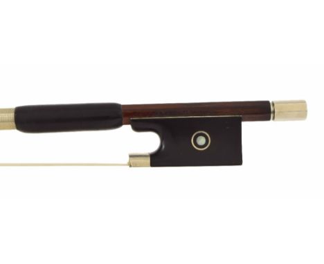 Good silver mounted violin bow by and stamped *Arnold Voigt*, the stick octagonal, the ebony frog inlaid with silver rings en