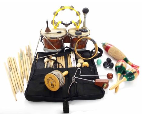 Quantity of percussion instruments, including a pair of bongos, tambourines and various shakers; also a Zildjian stick bag wi