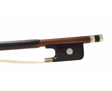 Silver mounted violoncello bow, unstamped, the stick round, the ebony frog inlaid with pearl eyes and the ebony adjuster with