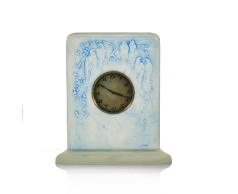 Rene Lalique, a Six Hirondelles Perchees glass clock, model 763, designed circa 1920, frosted and blue stained, relief moulde