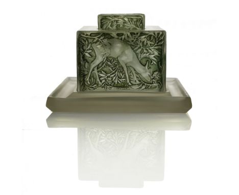 Rene Lalique, a Biches glass inkwell, model number 427, designed circa 1912, frosted and green stained, with liner and stand,