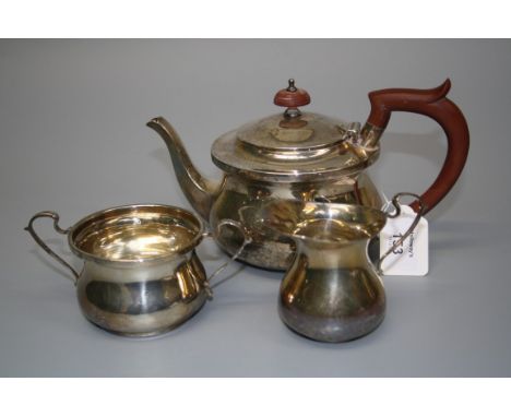 A silver three piece tea service, of bellied form, Chester 1927