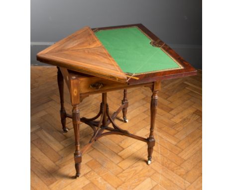 An Edwardian rosewood, boxwood paterae inlaid and strung envelope card table, the gilt tooled green plush lined top over sing