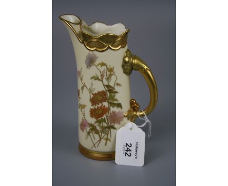 A Royal Worcester ice jug, design number 1229, with lotus petal rim and elongated loop handle, the florally decorated body on