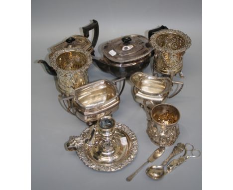 A pair of silver plated syphon stands, each with pierced swag decorated body on reeded supports and four paw feet, 15.5cm, a 