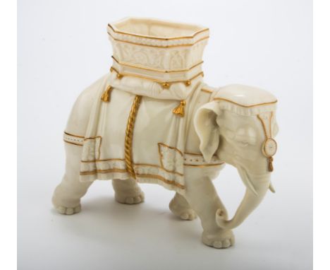 A Royal Worcester flower vase, modelled as a bull elephant with howdah, 19 x 23cm, impressed and moulded marks, circa 1873