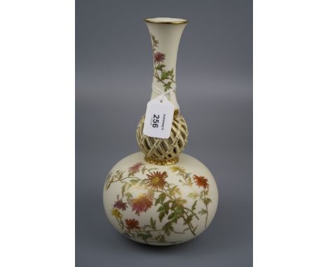 A Royal Worcester vase, of spherical form, with flared rim, tapering and reticulated knop neck, Design No 1158, florally deco