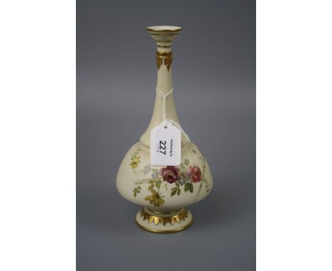 A late 19th century Royal Worcester single stem vase, with elongated tapering neck and florally decorated  body on an ivory a