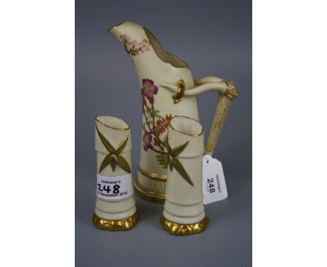 A Royal Worcester ice jug with tusk handle, design number 1116, together with a pair of faux bamboo vases, number 1049, 17cm 