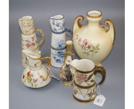 Six pieces of Royal Worcester porcelain, including a twin handled amphora vase, two conical jugs, a stem vase decorated with 