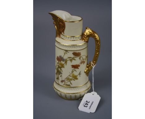 A Royal Worcester mask spout jug, design number 1366 with stepped cylindrical body and textured handle, 1889, 16cm