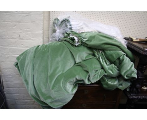 A pair of large jade green lined velvet curtains and one smaller matching curtain, main curtains 190cm drop x 510cm wide (3)
