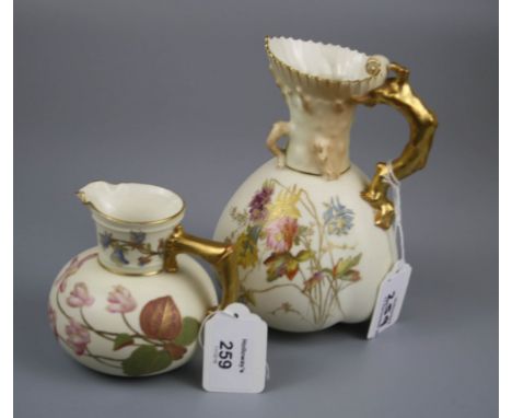 A Royal Worcester squat jug, of bun form with shouldered handle, Design 1376, 1889, together with a lobed body jug with textu