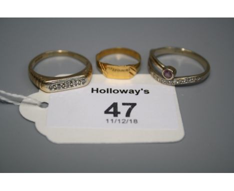 An 18ct gold diamond and amethyst cross-over ring, a five stone diamond half hoop ring and a yellow metal signet ring