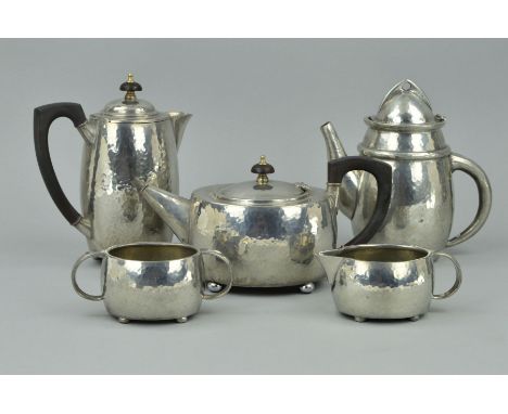 A LIBERTY &amp; CO TUDRIC PEWTER COFFEE POT, after a design by Archibald Knox, stamped 0232 to the base, height approximately