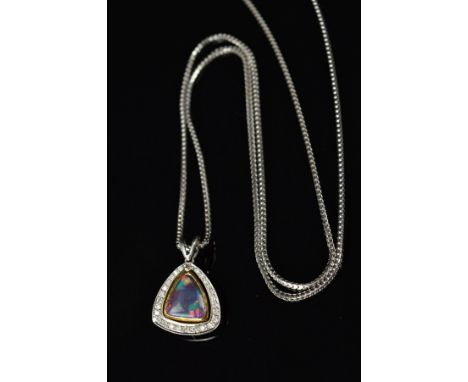 AN 18CT GOLD OPAL AND DIAMOND PENDANT NECKLACE, the triangular boulder opal cabochon suspended within a brilliant cut diamond