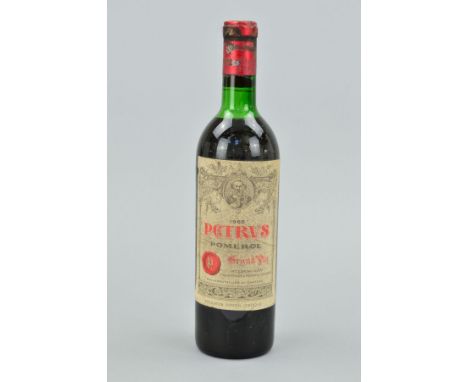 A BOTTLE OF PETRUS POMEROL 1968, fill level upper shoulder, seal intact but some staining, label is also dust stained from st