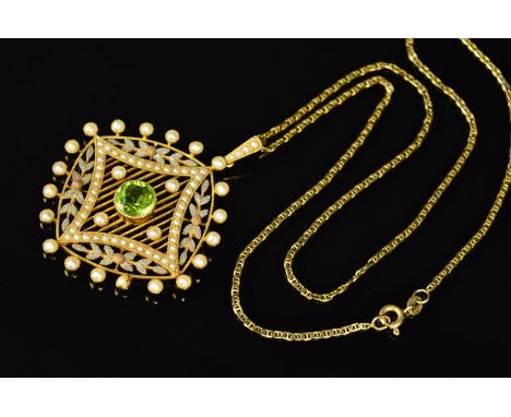 A GOLD CIRCULAR PERIDOT AND SEED PEARL BELLE EPOQUE PENDANT, centring on a round peridot milligrain set to an open work seed 