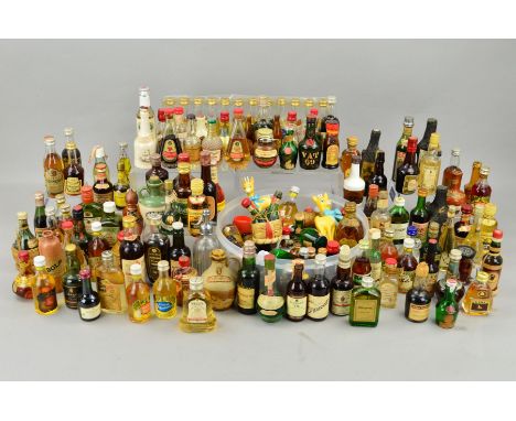 A LARGE COLLECTION OF MINIATURES including Whisky, Brandy, Benedictine, Tequila, Rum and many Continental style spirits, over