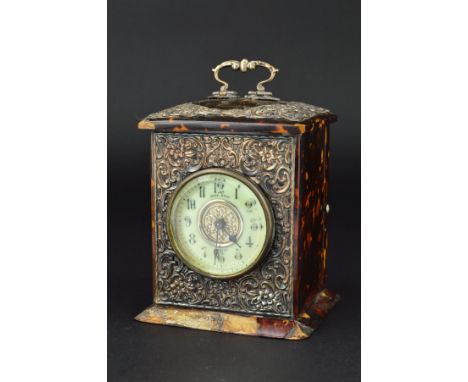 A LATE VICTORIAN/EDWARDIAN TORTOISESHELL AND SILVER MOUNTED CARRIAGE CLOCK, the circular enamel dial marked 'Monk Bros, Bolto