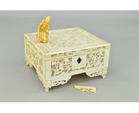 A LATE 19TH/EARLY 20TH CENTURY CHINESE CANTON IVORY SQUARE BOX, the hinged cover and sides carved and pierced with exotic bir