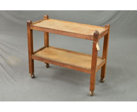 ROBERT 'MOUSEMAN' THOMPSON, an oak two tier tea trolley, on orbit castors, width 85cm x depth 39cm x height 75.5cm (condition