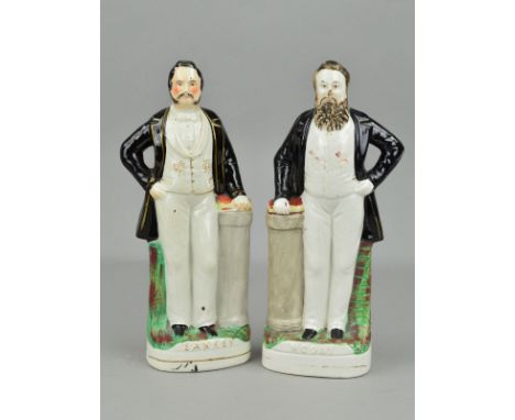 A PAIR OF VICTORIAN STAFFORDSHIRE POTTERY PORTRAIT FIGURES, of Moody and Sankey, each standing with hand resting on a book an