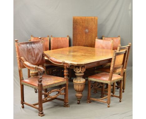A VICTORIAN OAK WIND OUT DINING TABLE, of rectangular form with canted corners, on bulbous turned and fluted legs, on ceramic