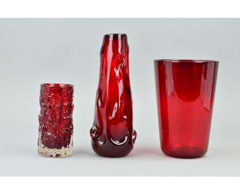 THREE WHITEFRIARS ART GLASS VASES, to include a 15cm ruby red bark vase with paper label, a ruby red knobbly vase, height 25c