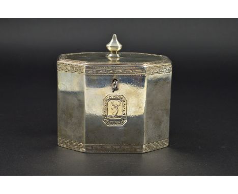 A GEORGE III SILVER TEA CADDY BY JOHN WAKELIN &amp; WILLIAM TAYLOR, London 1787, of octagonal form, hinged lid with knop fini