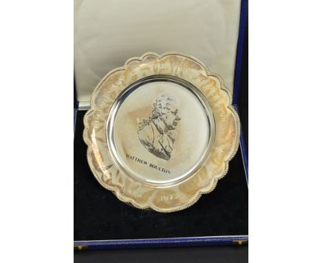 AN ELIZABETH II SILVER COMMEMORATIVE PLATE 'BI-CENTENARY OF THE BIRMINGHAM ASSAY OFFICE 1773-1973', of wavy circular form, ga