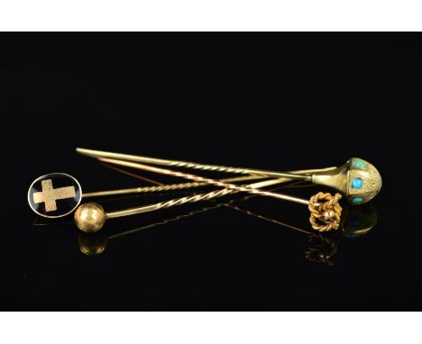 FOUR LATE 19TH TO EARLY 20TH CENTURY STICKPINS, the first of rope twist knot design, the second a faceted sphere, the third a