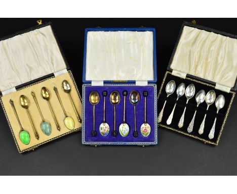 A CASED SET OF SIX ELIZABETH II SILVER GILT HARLEQUIN ENAMEL COFFEE SPOONS, makers William Suckling Ltd, Birmingham 1960, a c