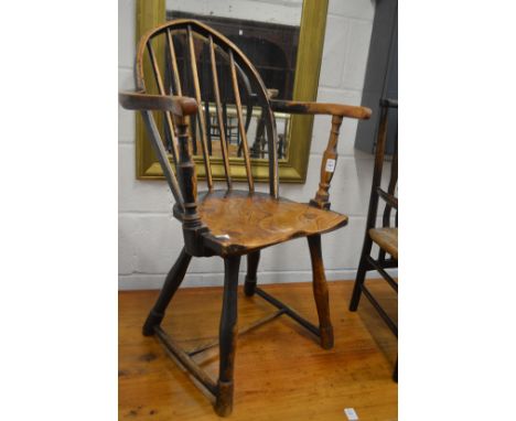 An unusual small 19th century ash, beech and elm Windsor stick back armchair.