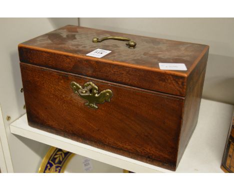 A Georgian mahogany tea caddy.