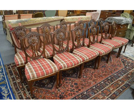 A good set of twelve Chippendale style shield back mahogany dining chairs.