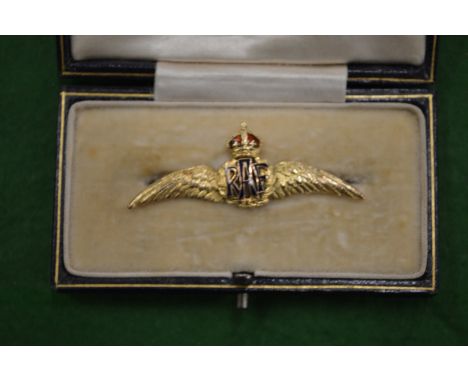 A 9ct gold and enamel RAF brooch.