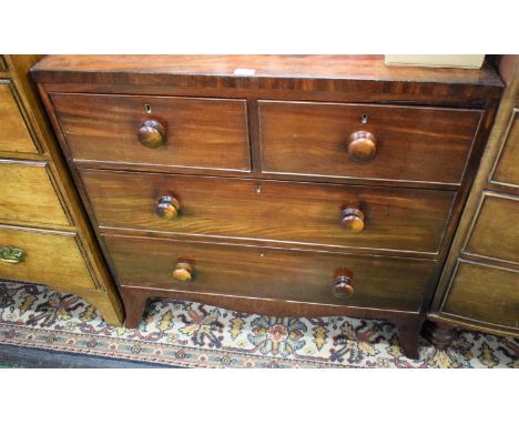  A Victorian mahogany chest, caddy top, two short cockbeaded drawers over two graduated long, turned handles, spreading brack