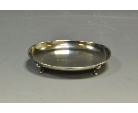 A George V silver oval dressing table trinket tray, cabriole legs, Birmingham 1930