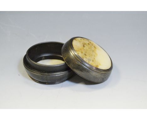 A 19th century horn and soapstone snuff box