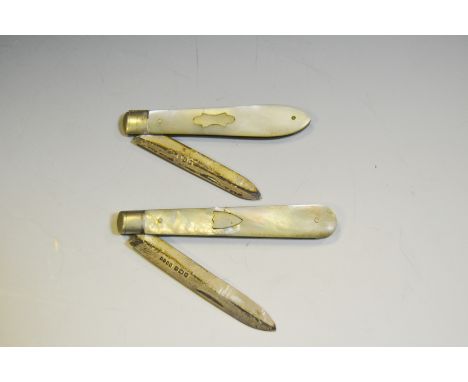 A silver and mother of pearl pen knife; another smaller (2)